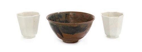 A Brown Glazed Stoneware Tea Bowl Diameter of largest 5 1/8 inches.
