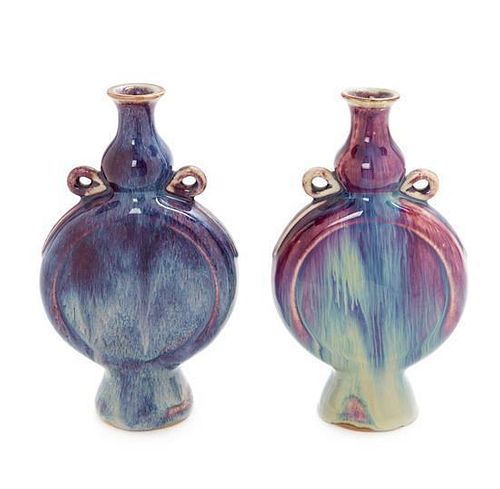 A Pair of Flambe Porcelain Flasks Height of each 9 inches.