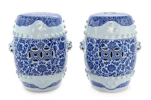 * A Pair of Blue and White Porcelain Garden Stools Height 20 x diameter 7 inches.