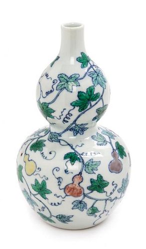 A Doucai Porcelain Gourd-Form Vase Height 7 1/2 inches.