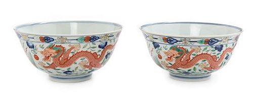 * A Pair of Wucai Porcelain 'Dragon and Phoenix' Bowls Diameter 6 1/8 inches.
