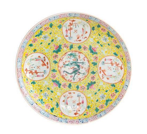 A Famille Jaune Porcelain Plate Diameter 9 5/8 inches.