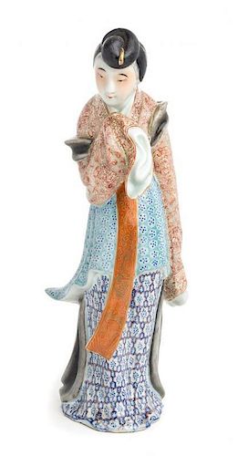 * A Famille Rose Porcelain Figure of a Meiren Height 9 3/4 inches.