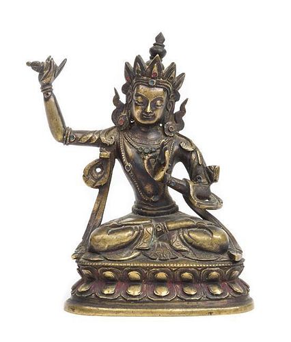 A Sino-Tibetan Bronze Figure of Manjusri Height 4 1/2 inches.