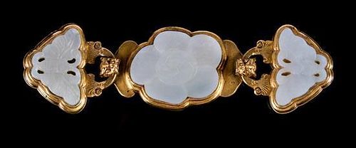A Celadon Jade Inset Gilt Bronze Belt Buckle Length 6 inches.