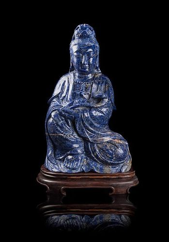 * A Lapis Lazuli Figure of Guanyin Height 24 inches.