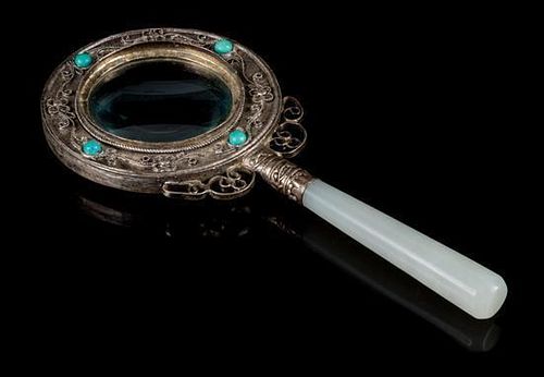 A White Jade and Silver Magnifying Glass Length 6 3/4 inches, width 3 inches.