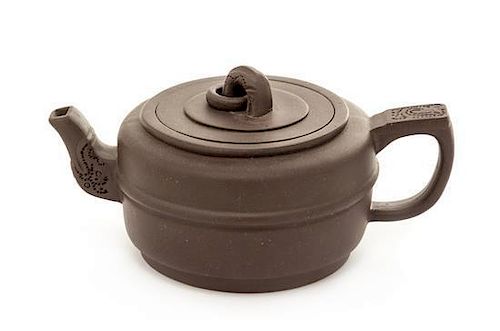 A Yixing Pottery Teapot Height 2 3/8 inches.