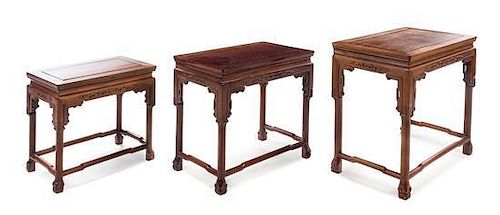 A Set of Three Chinese Rosewood Nesting Tables Height of tallest 24 x length 28 x depth 16 inches.
