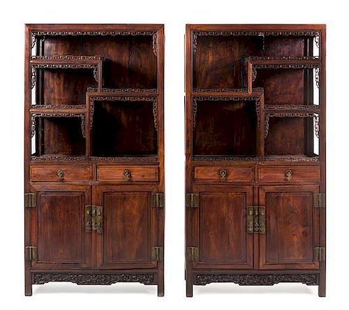 A Pair of Chinese Hardwood Displaying Cabinets 77 x 39 1/2 x 14 3/4 inches.