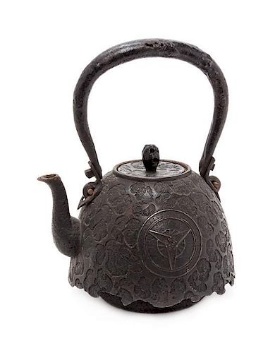 * A Cast Iron Teapot, Tetsubin Height 8 inches.