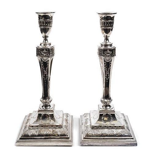 A Pair of Sheffield Plate Candlesticks, Late 18th Century, Height 12 inches.