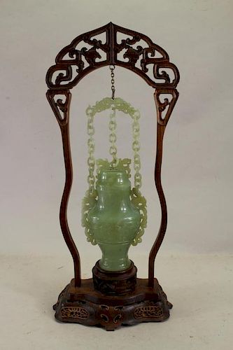 Chinese Jade Vase in Reticulated Wooden Stand