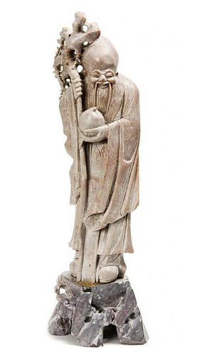 A Hardstone Carving of a Scholar, Height 17 1/2 inches.