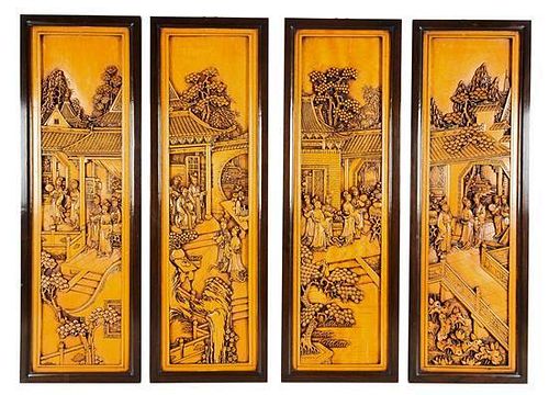 A Collection of Four Carved Chinese Panels, Height of each 40 x width 13 inches.