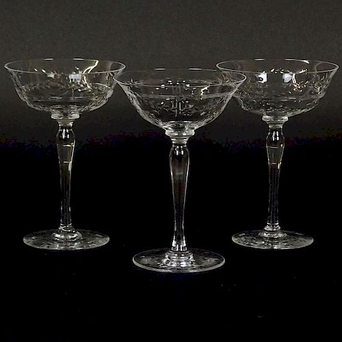 Three Vintage Etched Crystal Champagne Coupes.