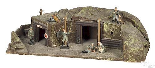 German painted wood and composition trench
