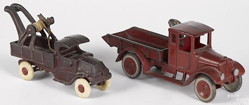 Two cast iron trucks