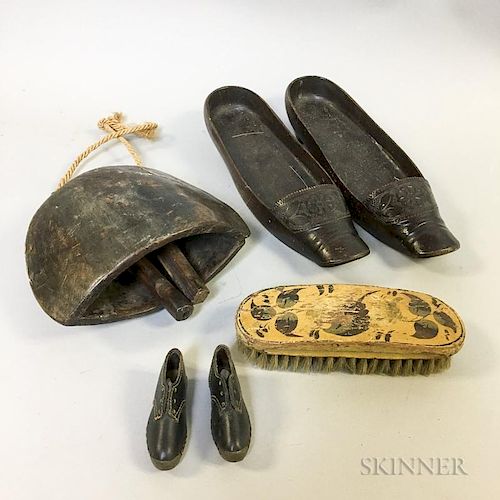 Two Pairs of Carved Wooden Shoes, a Wooden Bell, and a Stenciled Brush.  Estimate $50-75