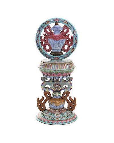 A Buddhist Famille Rose Altar Ornament, Height 12 inches.