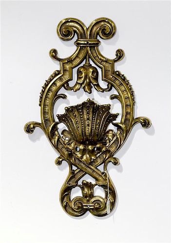 A Brass Applique Height 23 x width 14 1/2 inches.