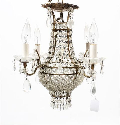 * A Continental Beaded Four-Light Chandelier Diameter 14 1/2 inches.