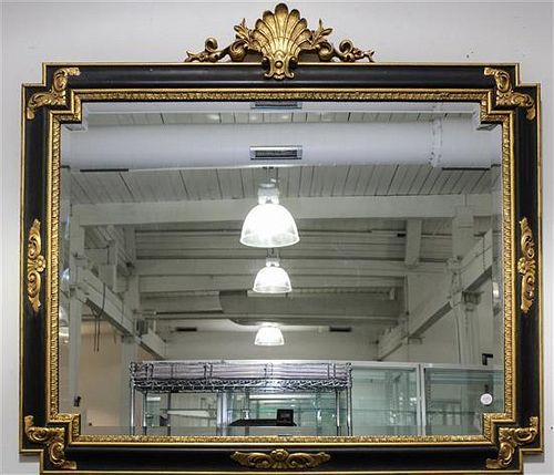 An Ebonized and Parcel Gilt Mirror Height 44 x width 48 3/4 inches.