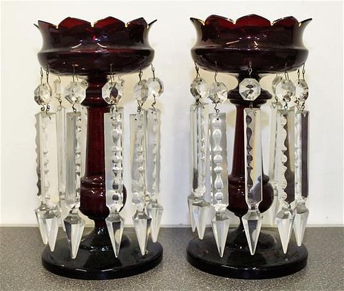 A Pair of Ruby Glass Lusters Height 12 1/4 inches.