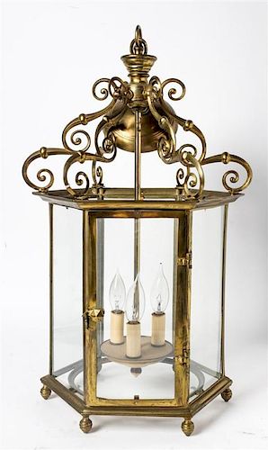 A Georgian Style Brass Lantern Height 23 1/2 inches.