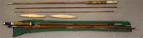 Two Vintage Bamboo Fishing Rods Length of first 107 inches.