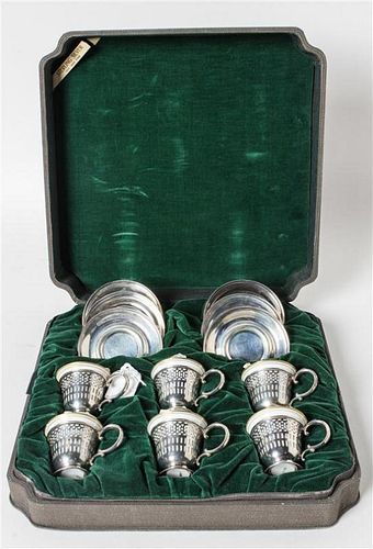 Six American Silver Demitasse Cups and Saucers, Webster Co., North Attleboro, MA, with gilt decorated porcelain liners.