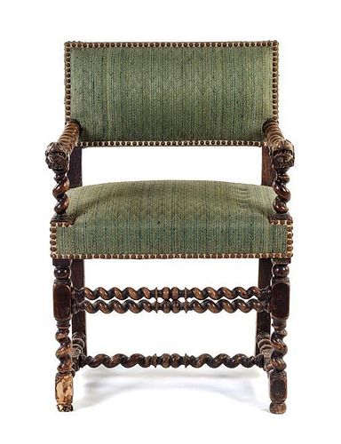 * An English Baroque Style Walnut Armchair Height 34 1/2 inches.
