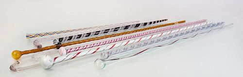 GROUP OF NINE APPLIED AND INTERNALLY-DECORATED GLASS CANES