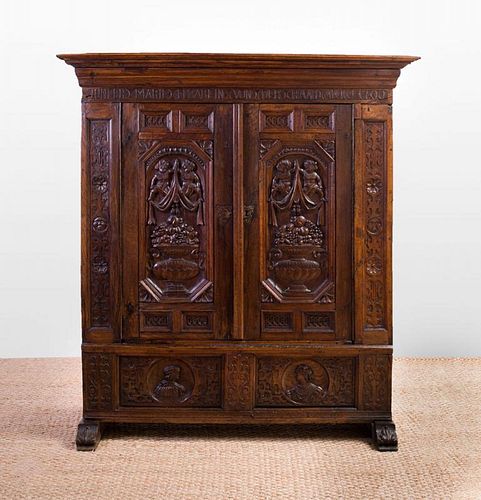 CONTINENTAL CARVED WALNUT ARMOIRE