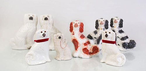 THREE PAIRS OF STAFFORDSHIRE POTTERY SPANIELS
