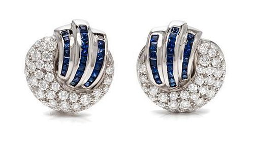 * A Pair of 18 Karat White Gold, Diamond and Sapphire Earclips, Italian, 12.15 dwts.