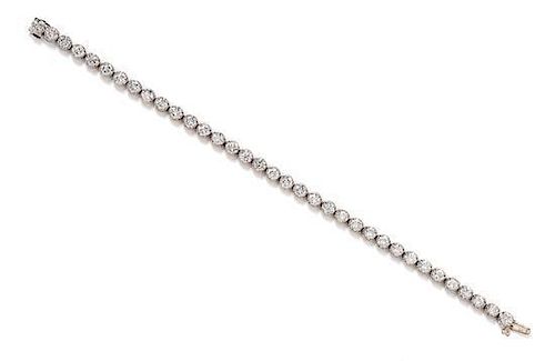 A White Gold and Diamond Line Bracelet, 10.40 dwts.