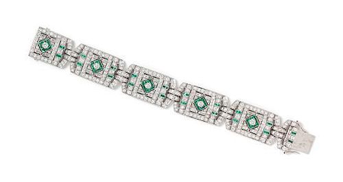 An 18 Karat White Gold, Diamond and Emerald Bracelet, 45.40 dwts.