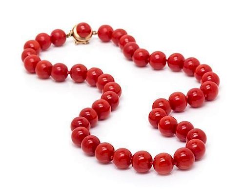 * A Single Strand Coral Bead Necklace, 36.20 dwts.