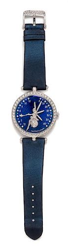 An 18 Karat White Gold and Diamond 'Lady Arpels FÃˆerie' Wristwatch, Van Cleef and Arpels,