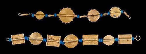 * A Pair of Akan Gold Alloy, Metal Alloy, Glass Bead Bracelets, CÃ™te d'Ivoire/Ghana, consisting of two bracelets, one bra