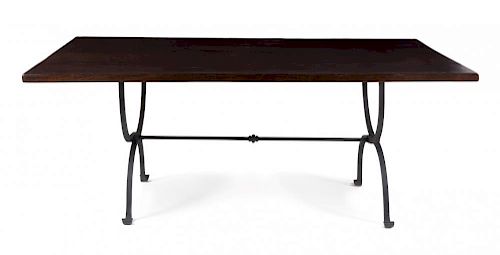 A Wrought Iron and Oak Dining Table Height 32 1/4 x length 85 x depth 46 1/4 inches.