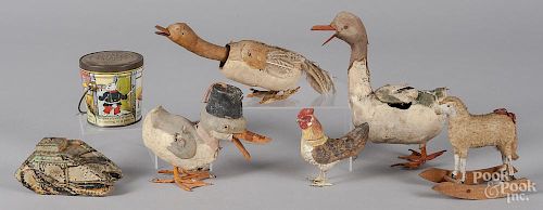 Three pressed cardboard duck candy containers