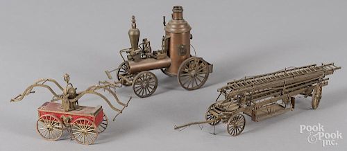 Three miniature brass horse drawn fire apparatus