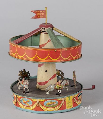 Wolverine tin lithograph wind-up merry-go-round