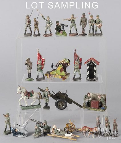 Painted composition soldiers and field guns