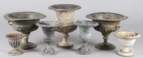 Seven assorted metal urns