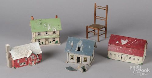 Four painted wood Christmas houses