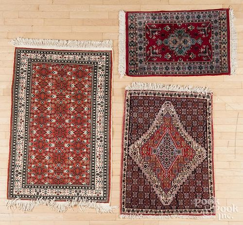 Three contemporary oriental mats