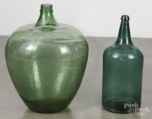 Two large antique green glass bottles